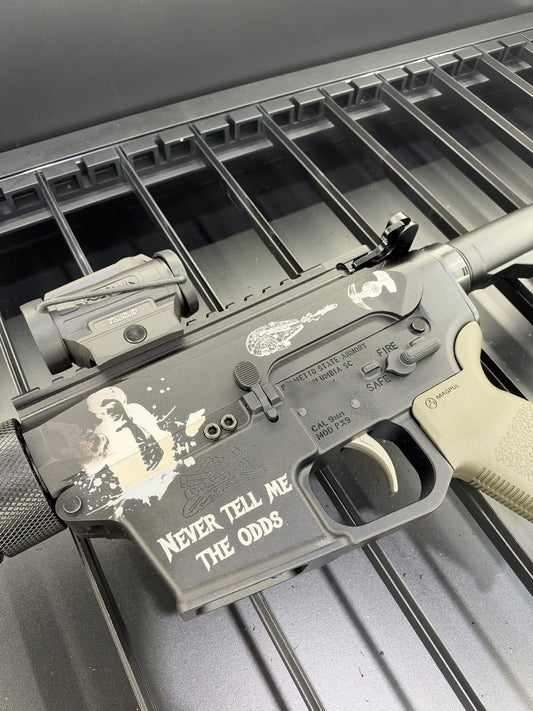 Custom laser-engraved AR-15 lower receiver with white Star Wars-themed artwork, serial blurred
